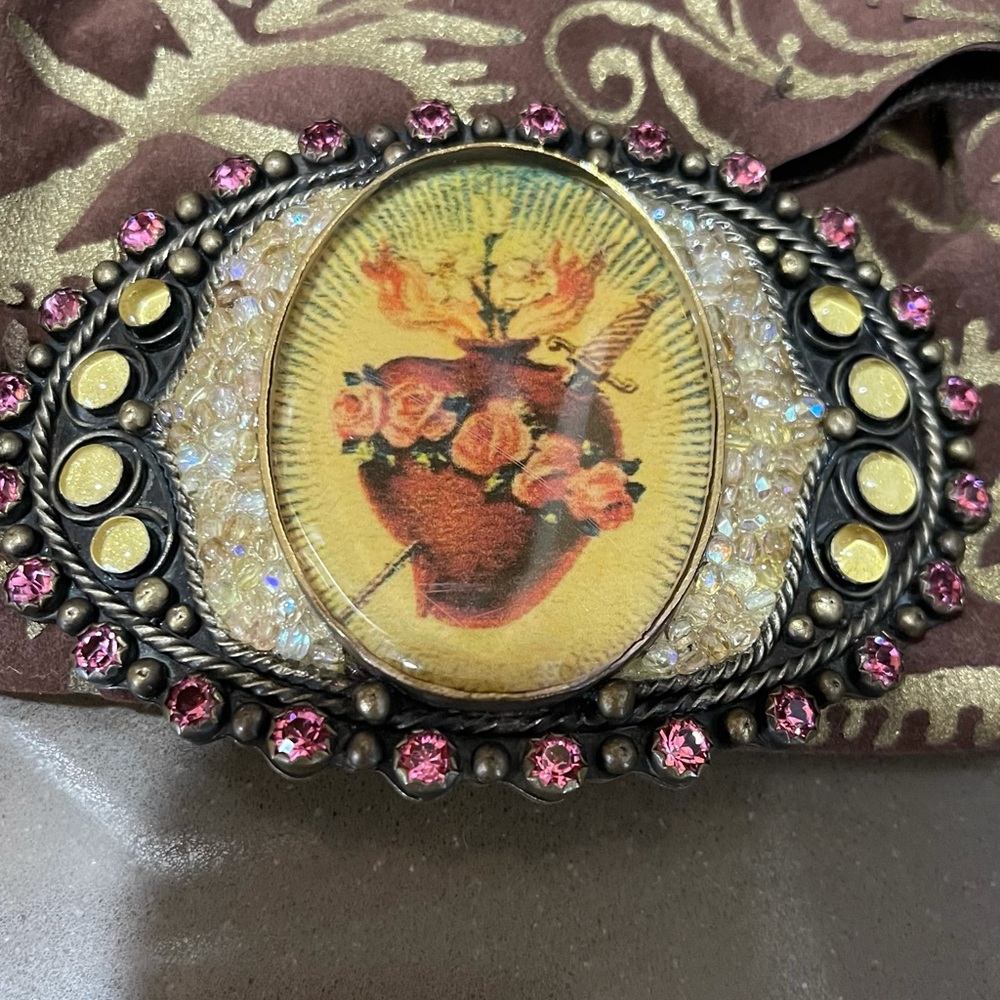 Virgins Saints & Angels belt buckle.